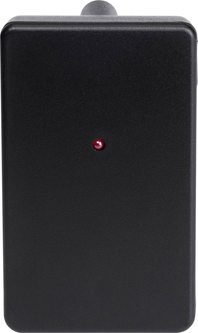 Black rectangular device with a small red light in the centre.
