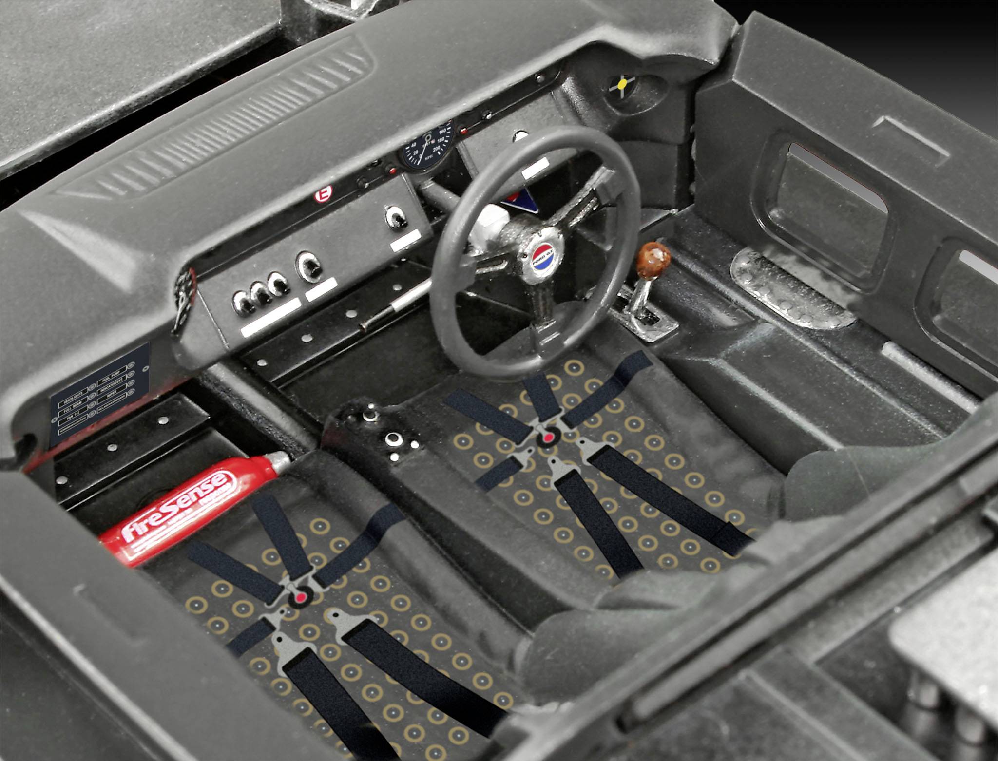 Interior view of a car with safety belts. Steering wheel, dashboard with buttons and a fire extinguisher are visible.