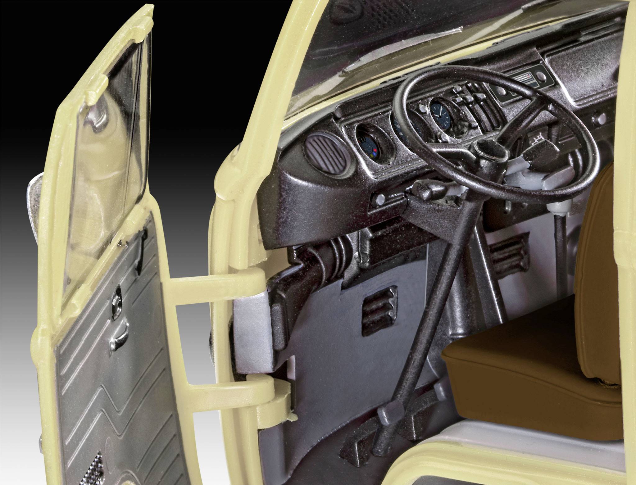 Interior of a model car with the driver's area open: steering wheel, dashboard, and seat are visible. Detailed replica.