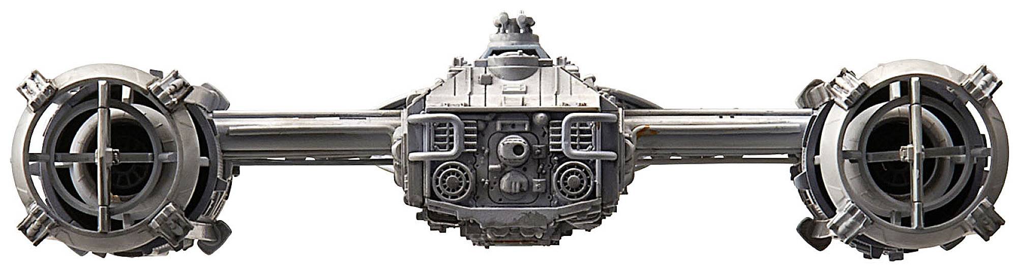 Spacecraft with a circular, robust design, metallic surfaces, and two large engines on the sides. Central control console visible.