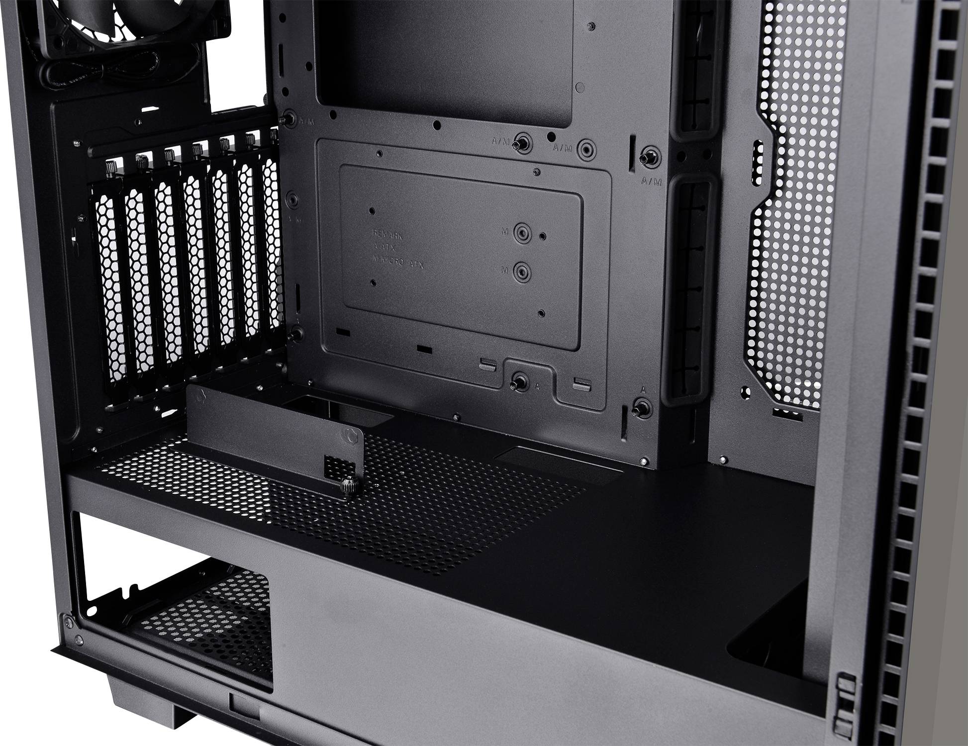 An empty computer case reveals the interior with space for hardware components such as motherboard, hard drives, and power supply.