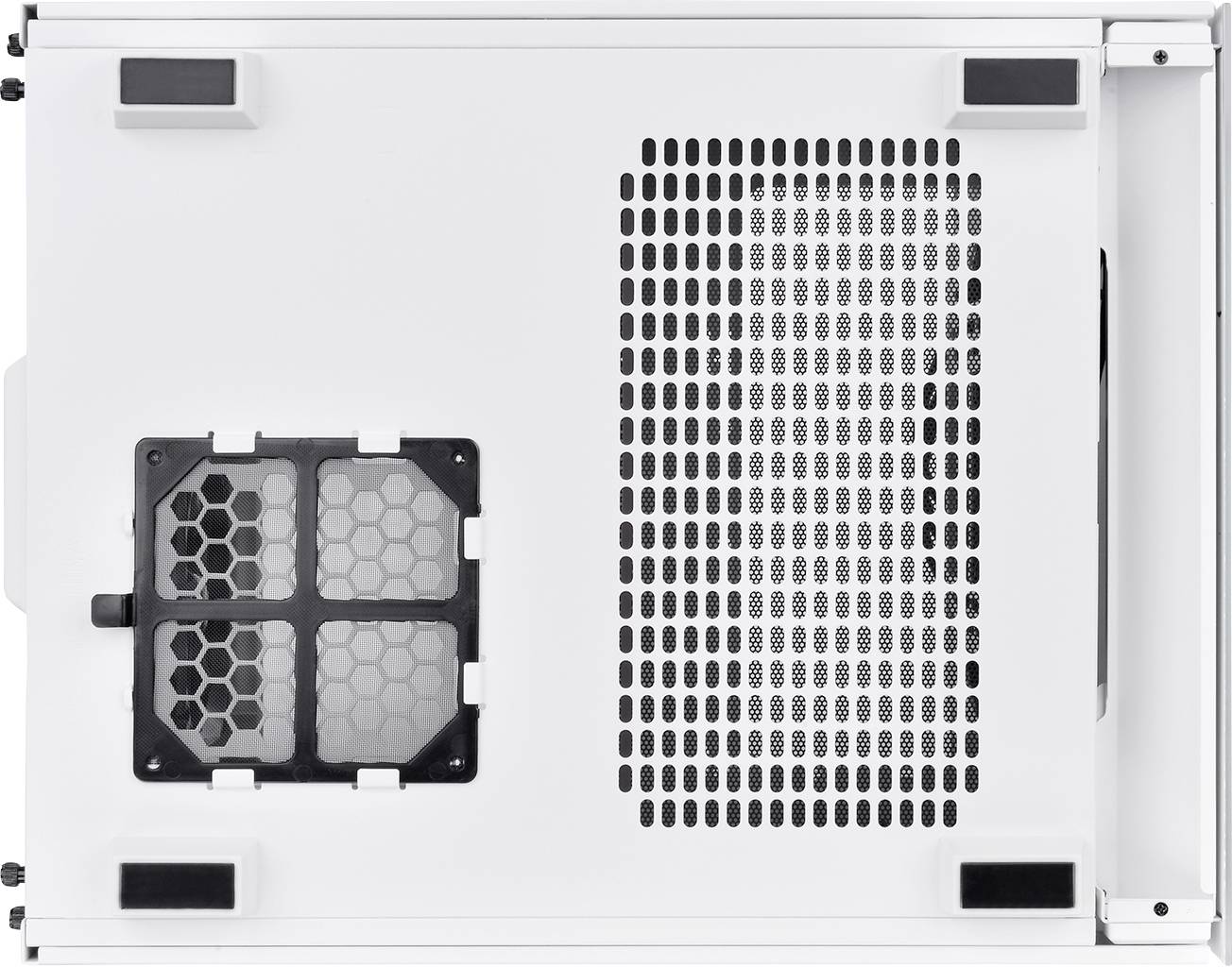 White computer case viewed from above, showing ventilation slots and a square opening with a black grille on the left side.