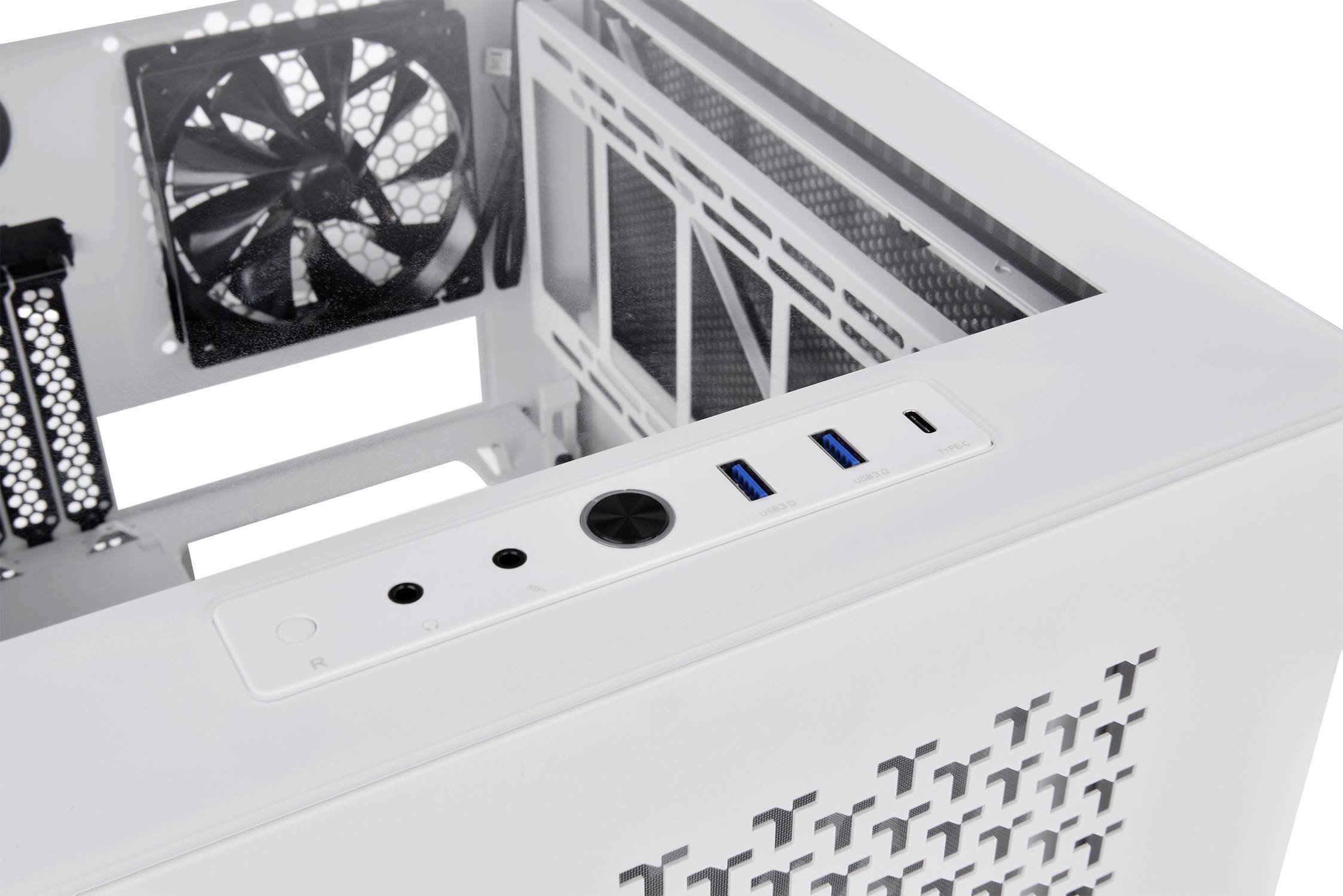 Close-up of a white computer tower with fan, USB ports, and ventilation grilles.