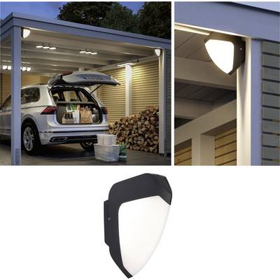 Car with open boot parked under illuminated carport. Shopping bags inside. Second image shows a close-up of the wall-mounted light.