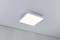 A rectangular ceiling light emits uniform, soft light. It is mounted on a white, textured ceiling.