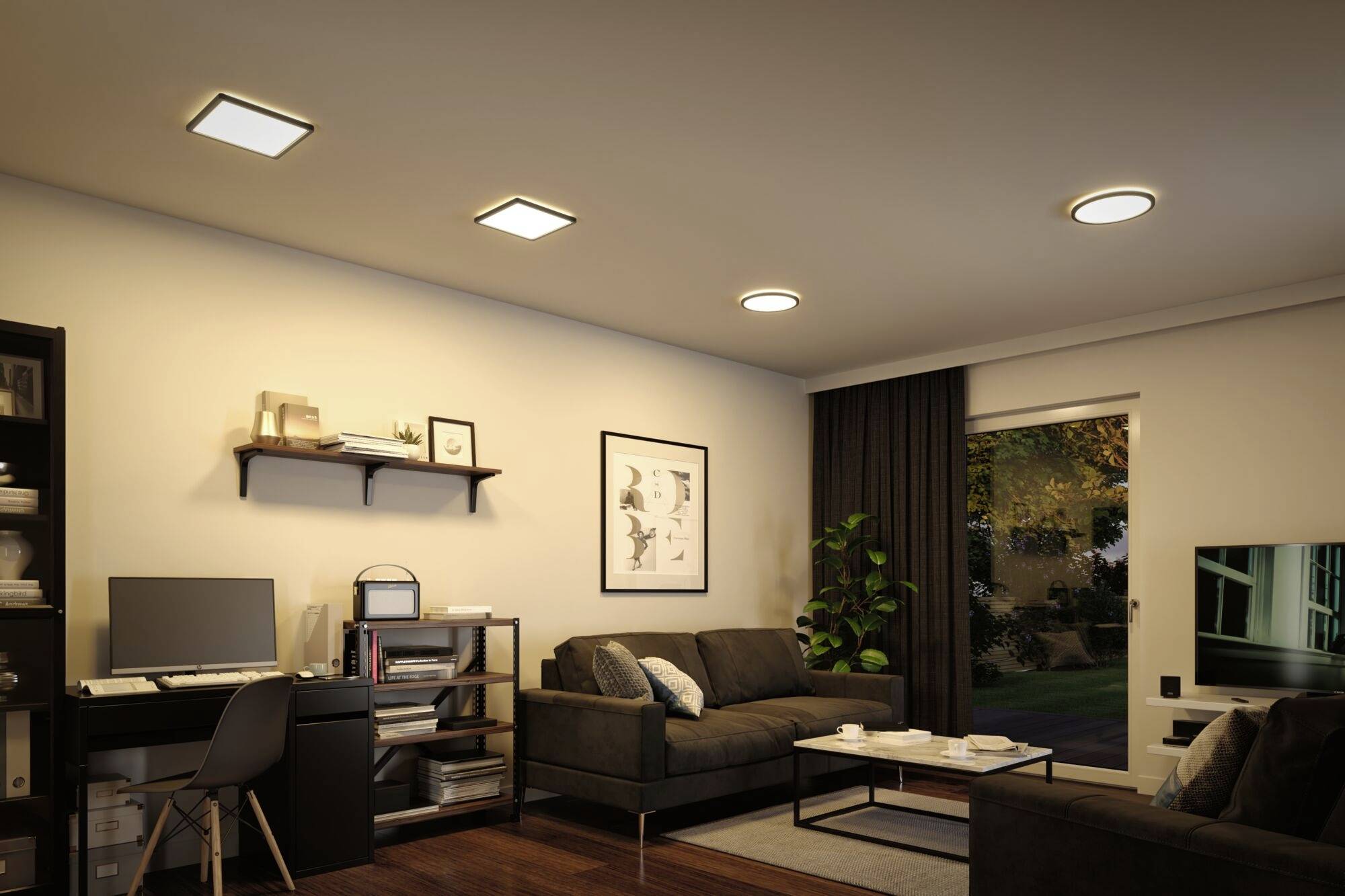 A modern living room with bright ceiling lighting. On the left is a desk with a PC, and on the right a sofa is positioned in front of a window with curtains.