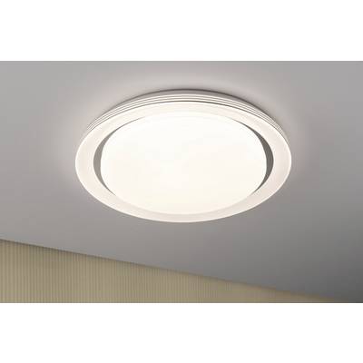 Round, modern ceiling light with LED lighting on a bright room ceiling.