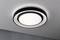 Round ceiling light with modern design, distributes even light. It is mounted on a white-painted ceiling.
