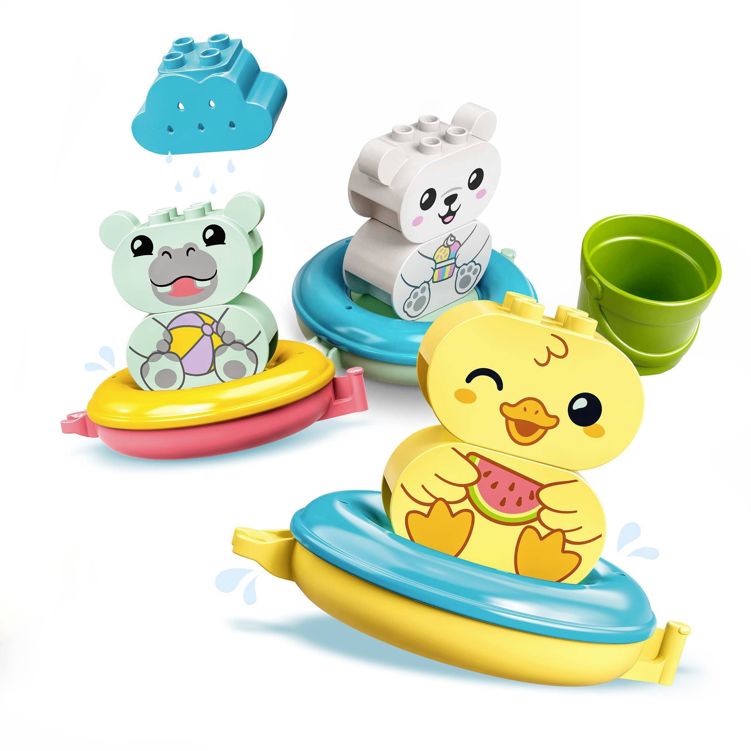 Three colourful animal figurines made from building blocks: a hippopotamus, a bear, and a duck, each on boats, with a small watering can.