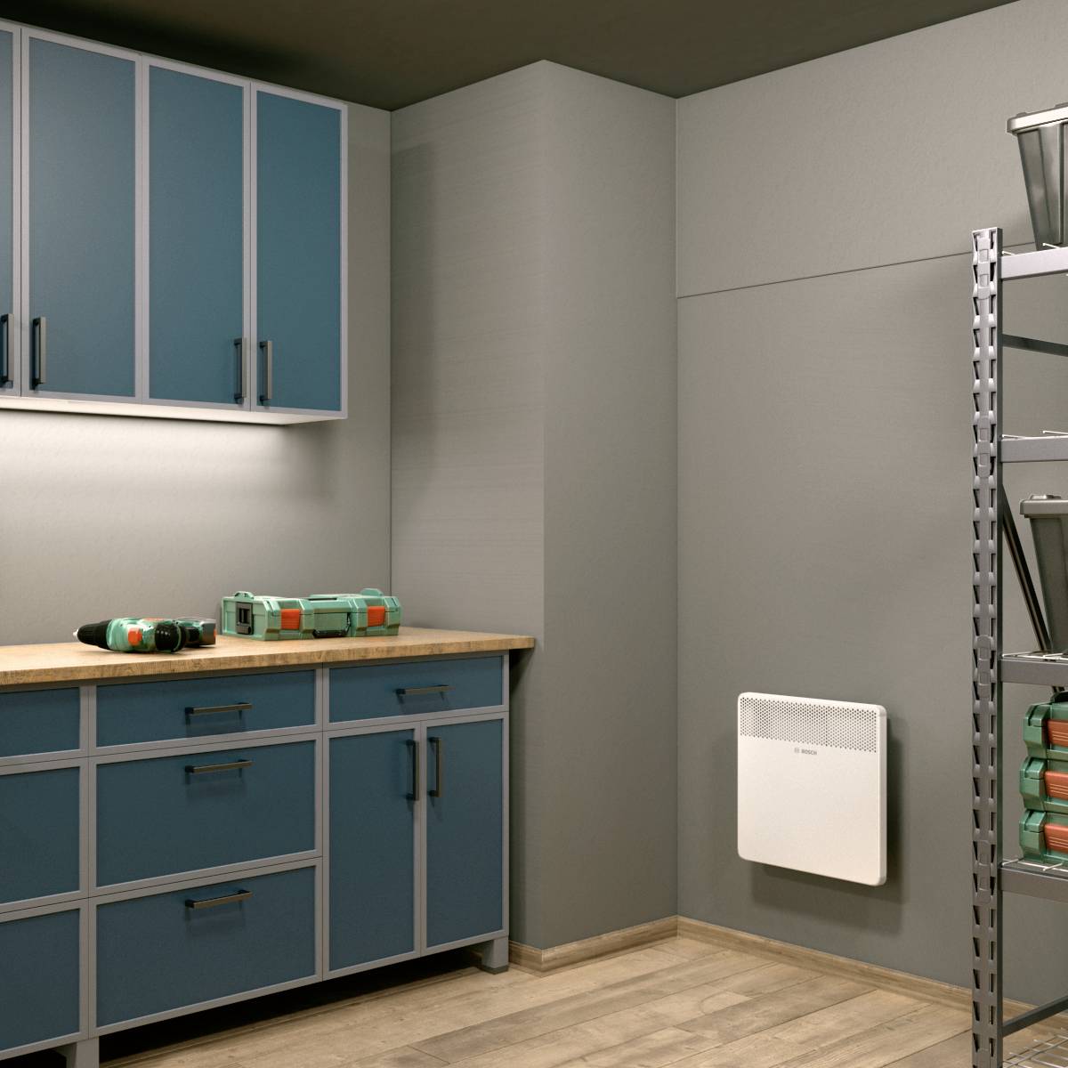 A room with blue cupboards and wooden surfaces. Small toolboxes are lying on the cupboards. A shelf stands to the right.