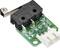 'End switch module with green PCB and Zing Ear microswitch. White connector and three solder pins.'