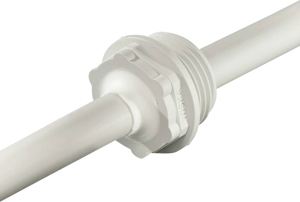A white pipe is connected to a plastic coupling element.