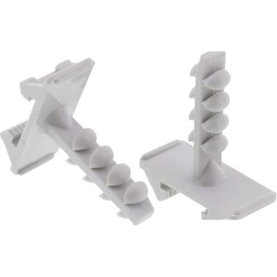 Two white plastic wall plugs with elongated, ribbed structures. They are standing freely and are intended for fixing into plasterboard walls.