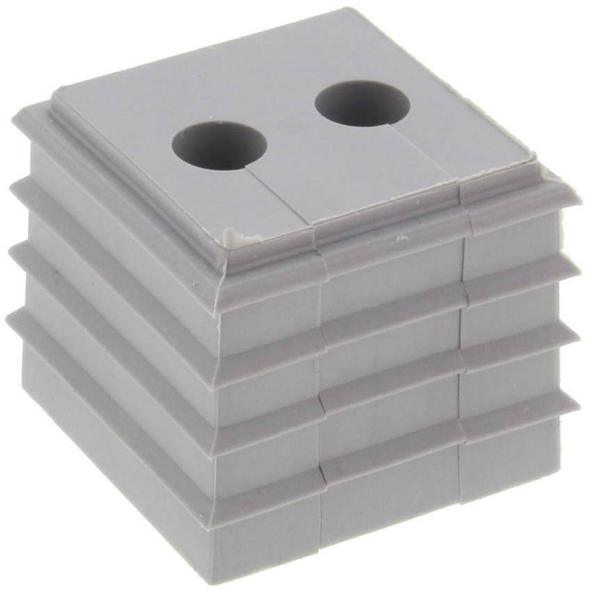 Small, grey, square plastic block with two round holes on the top surface, likely used for stabilisation or as a spacer.
