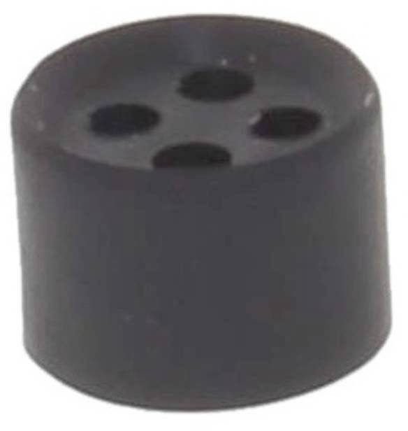 A black, round, cylindrical object with four holes on the top surface.
