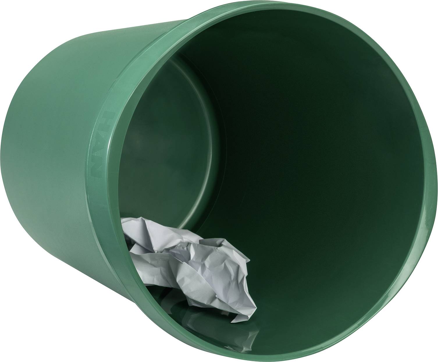 A green rubbish bin is positioned sideways, with crumpled pieces of paper visible inside.