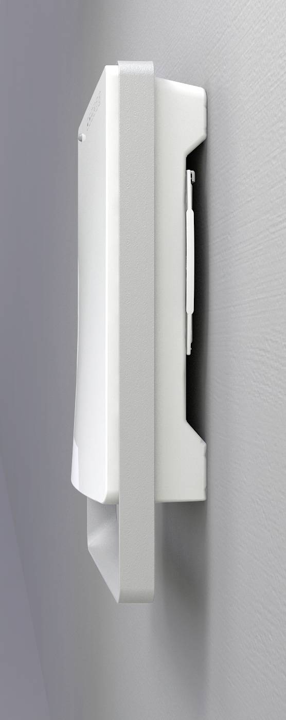 A white, rectangular device is mounted sideways on a grey wall.
