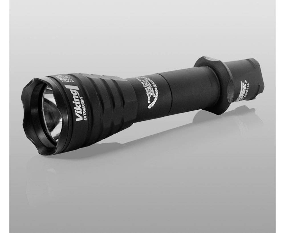 Black torch with robust design; 'Viking' printed on the side. It is pictured against a grey background with a focused lens.