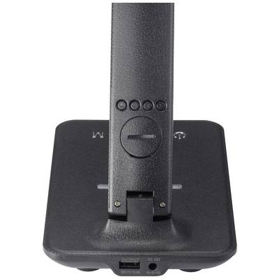 A black, rectangular stand with multiple buttons and connections on the back.