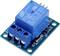 A blue electric relay switch with three screw terminals on a green circuit board, used for electronic control systems.