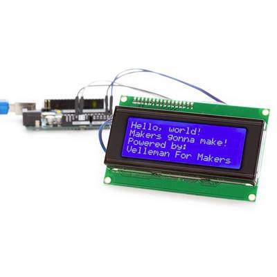 An LCD screen displays the message 'Hello, world! Makers gonna make! Powered by: Velleman For Makers'. An electronic circuit is visible in the background.