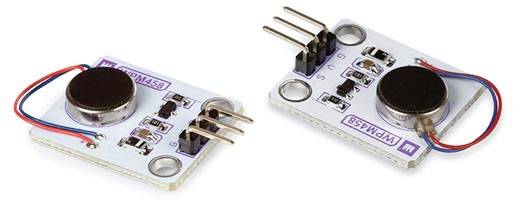 Two vibration motors on white modules with connection pins and coloured cables.
