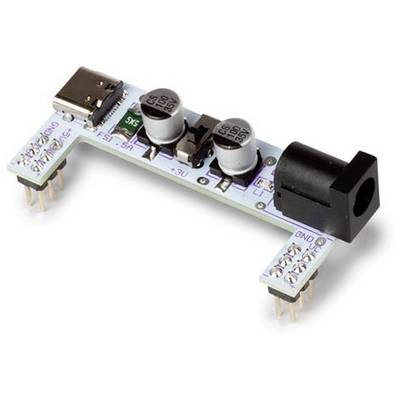 An electronic module with USB and socket connections, fitted with capacitors and pins, serves to regulate voltage.
