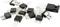 A group of black performance diodes and transistors with silver pins is scattered across a white surface.
