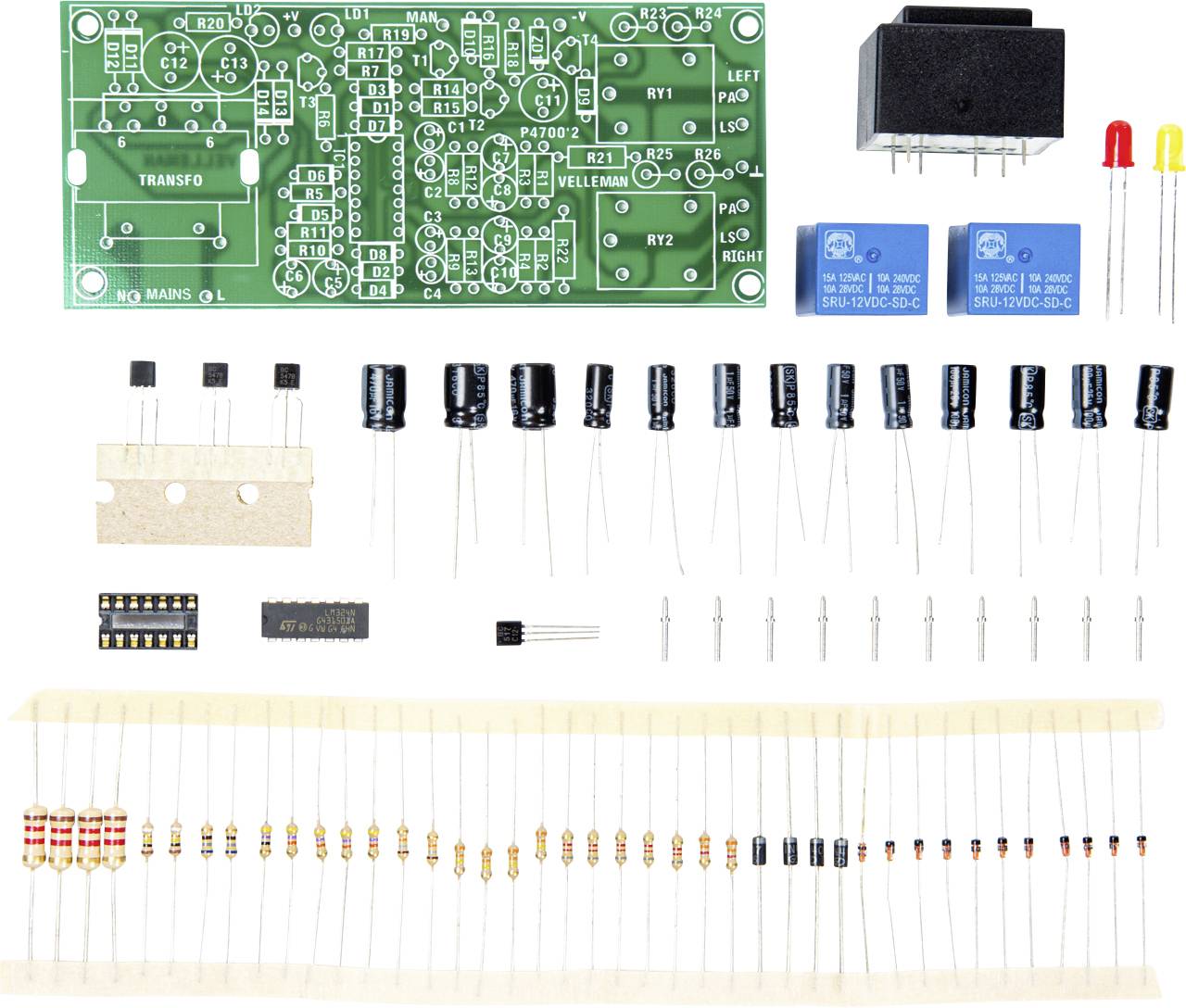 Electronic component kit on a white background, consisting of a green circuit board, capacitors, relays, resistors, and LEDs.