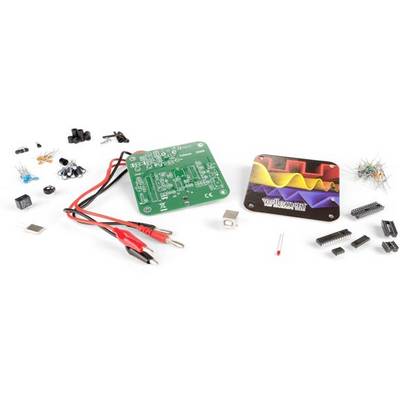 Electronic kit with circuit board, red and black cables, microchip and other small electronic components.