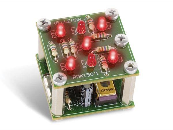 A small green circuit board with upright light-emitting diodes, resistors, and an integrated circuit component. Marked as 'Velleman PMK150' on the surface.