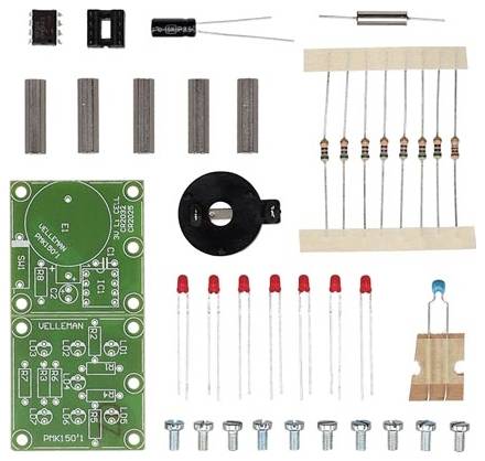 Electronic kit components: Circuit board, resistors, LEDs, microcontroller, capacitor and screws. Ideal for DIY projects.