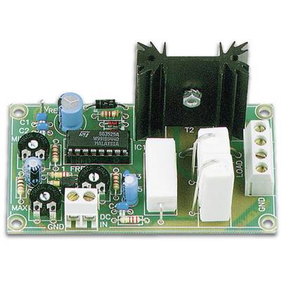 Electronic circuit with various components, including resistors, capacitors and a heatsink, mounted on a green printed circuit board.