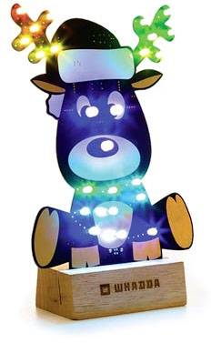 An electric reindeer kit with illuminating LED lights in various colours sits on a wooden base with the 'WHADDA' inscription.