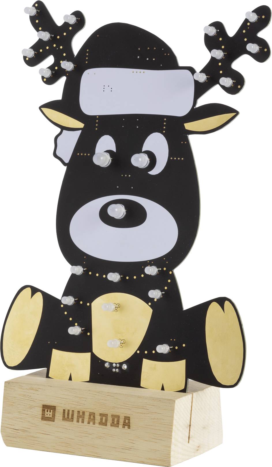 A black reindeer head with golden details and white lights is mounted on a wooden base.
