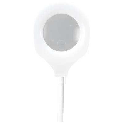 A small white cylindrical rod with a round, glossy surface that reflects light. It resembles a charger or a sensor.