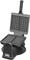 Waffle iron with open lid, ready for use. Black, vertical design on a sturdy base displays waffle pattern.