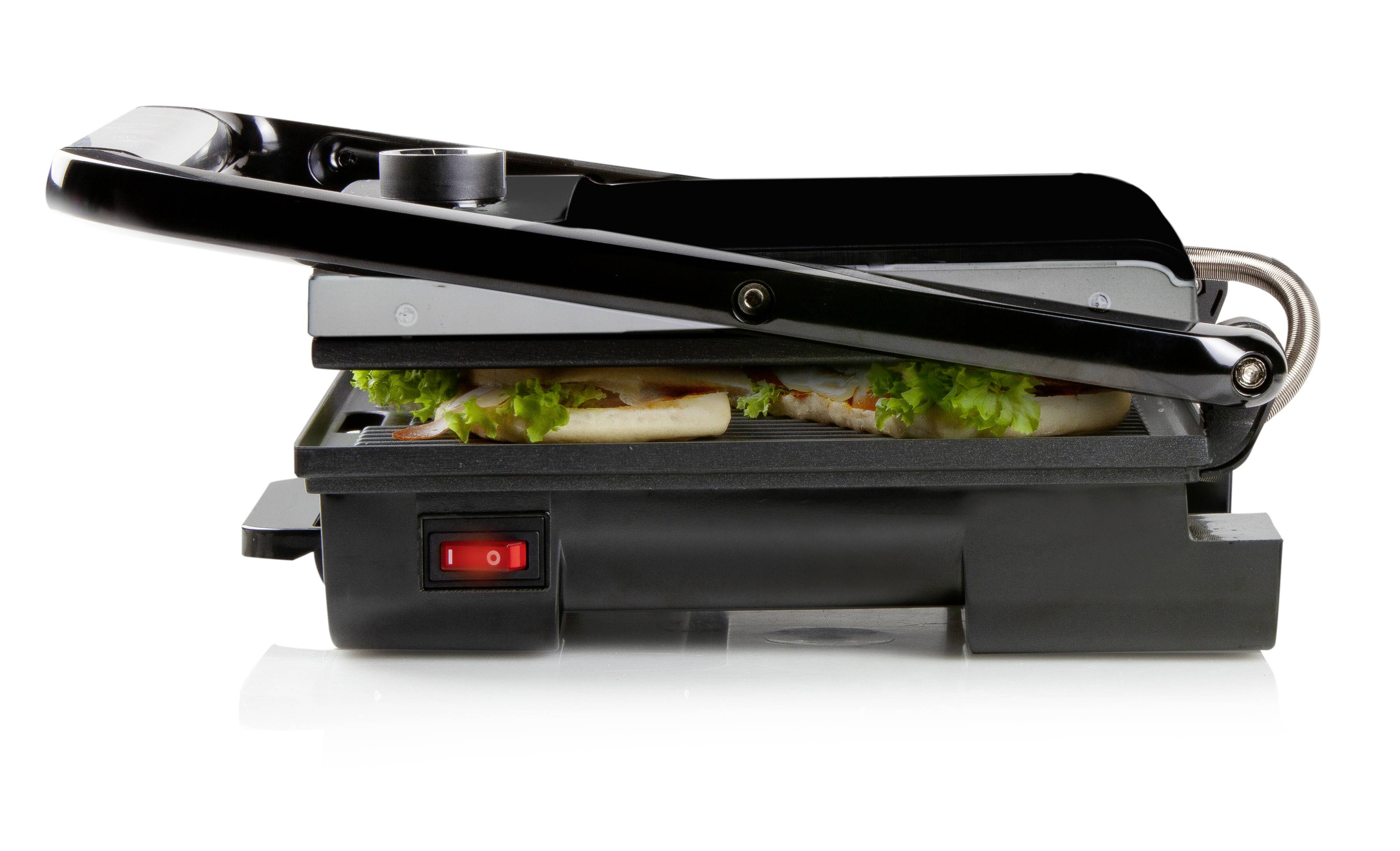A black sandwich maker with a sandwich inside is shown from the side, half-open, with a red indicator light illuminated.