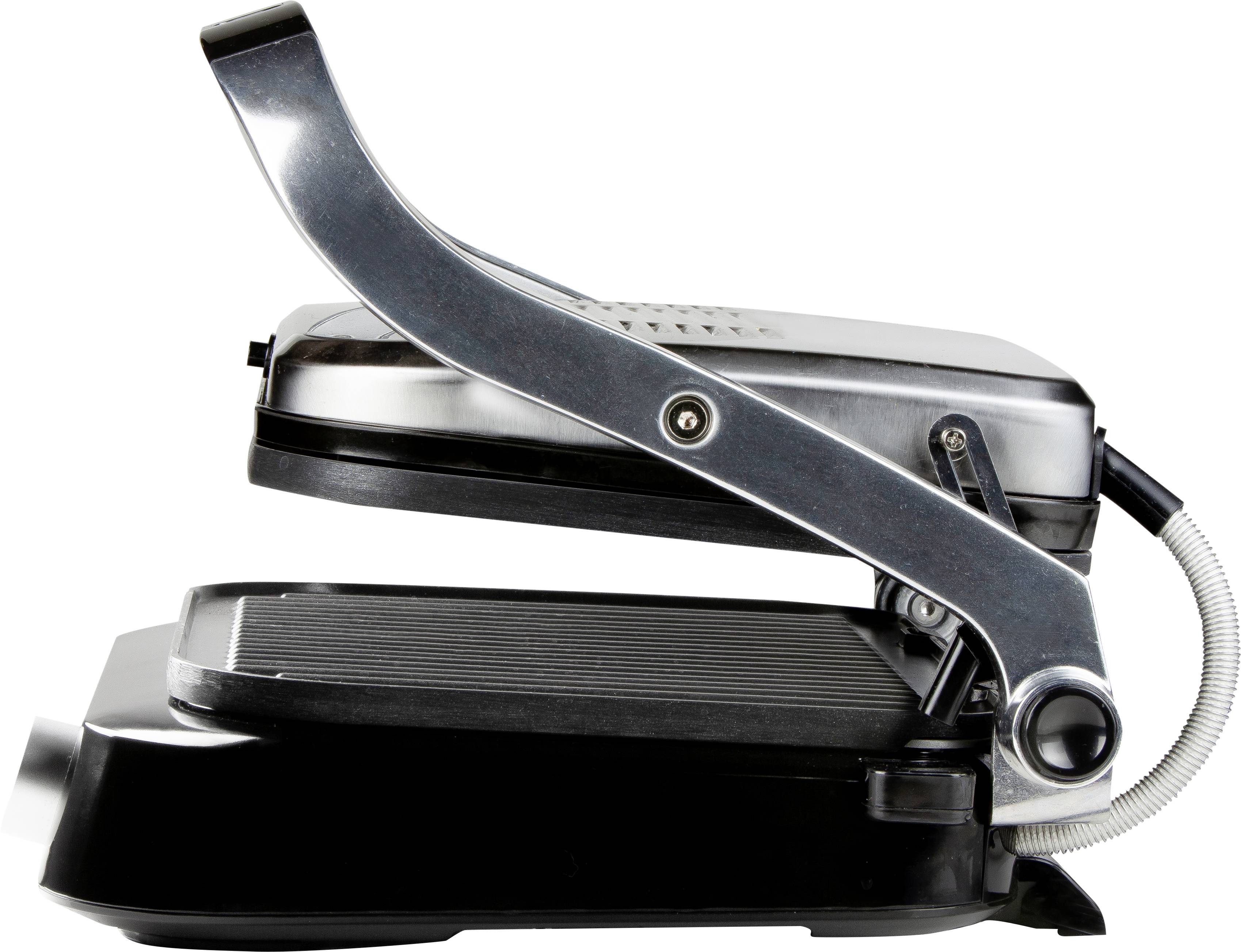 A closed sandwich toaster viewed from the side with a silver handle and black heating plates.