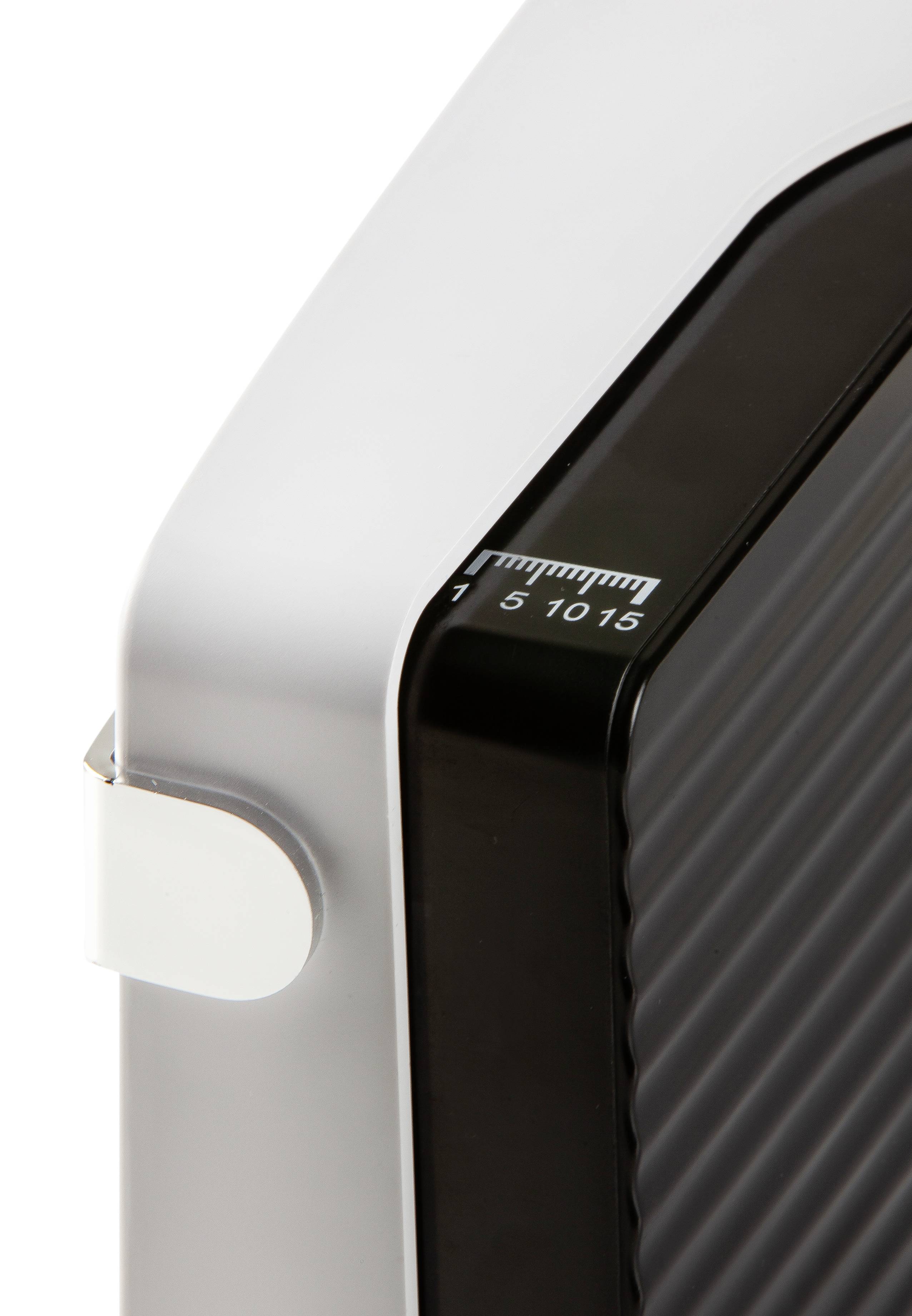 Close-up of a modern radiator with a rounded edge and a scale displaying numbers from 1 to 15 for temperature adjustment.