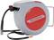 Grey and red automatic winder with the brand name 'Holzmann', showing a black hose with metal connectors.