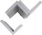Grey, angular metal parts standing at right angles to each other. They are arranged on a white surface.