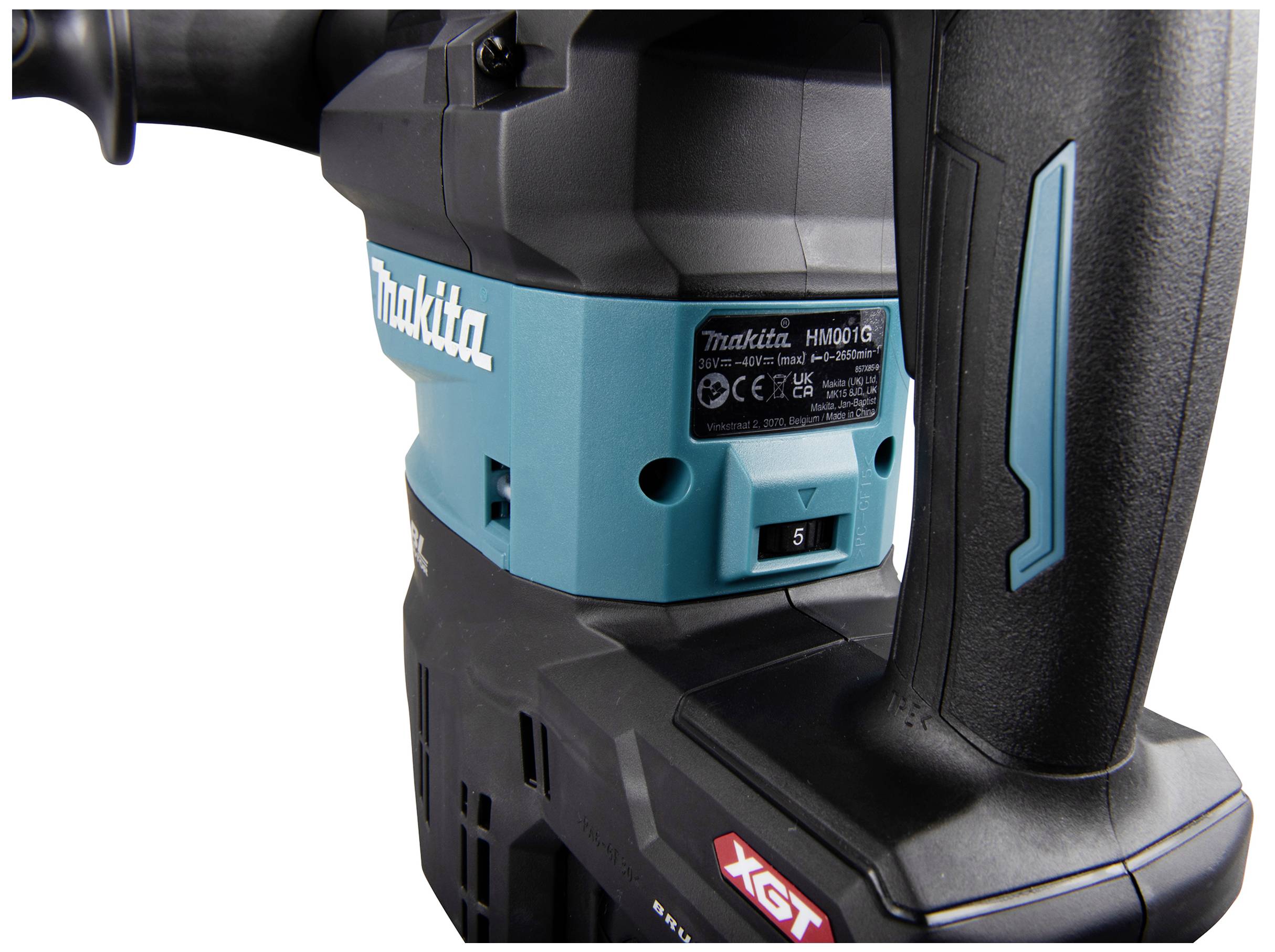 A Makita electric tool with model number HM001G, coloured blue and black, displays logos and a model plate.