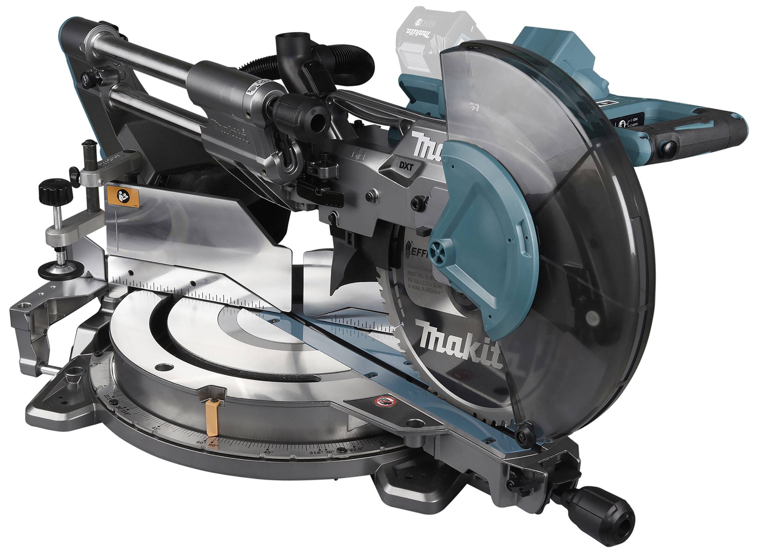 Mitre saw with electric drive, green and black, positioned on a workbench. Tool elements such as saw blade and measuring scale visible.