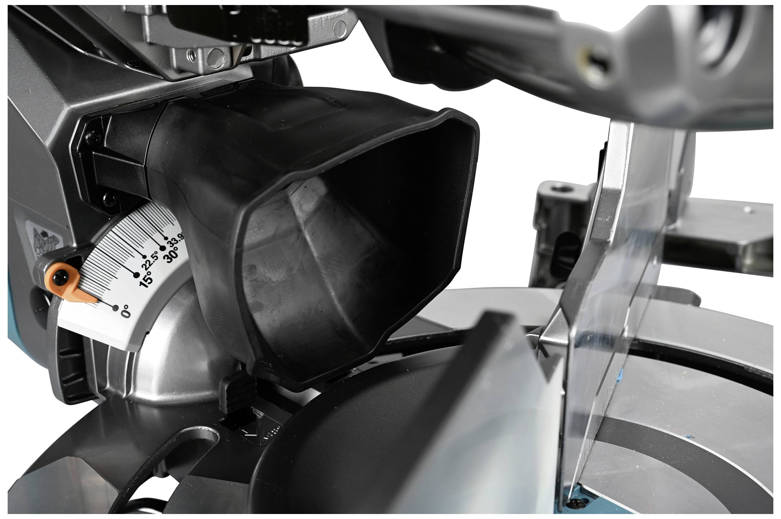 A close-up of a mitre saw reveals the angle gauge and sharp blade, ready for precise material cutting.