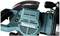 'Battery-powered, brushless Makita saw in close-up, showing ventilation slots and brand name on the casing.'