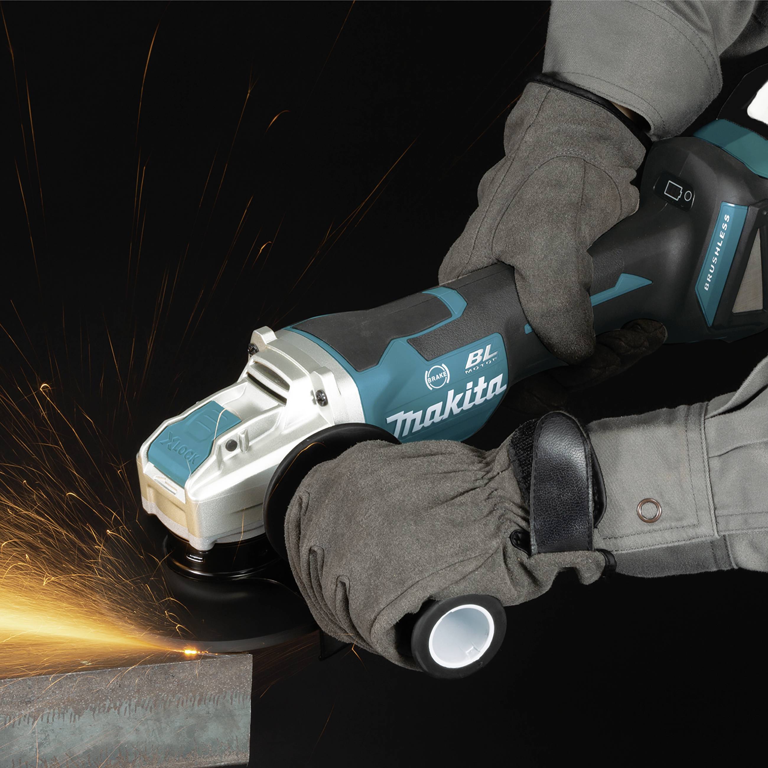 A person is working with an angle grinder, generating sparks. The scene depicts an action of grinding metal.