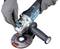 'A person is attaching a cutting disc to an angle grinder. The hands are wearing grey gloves, and the tool is blue and black.'