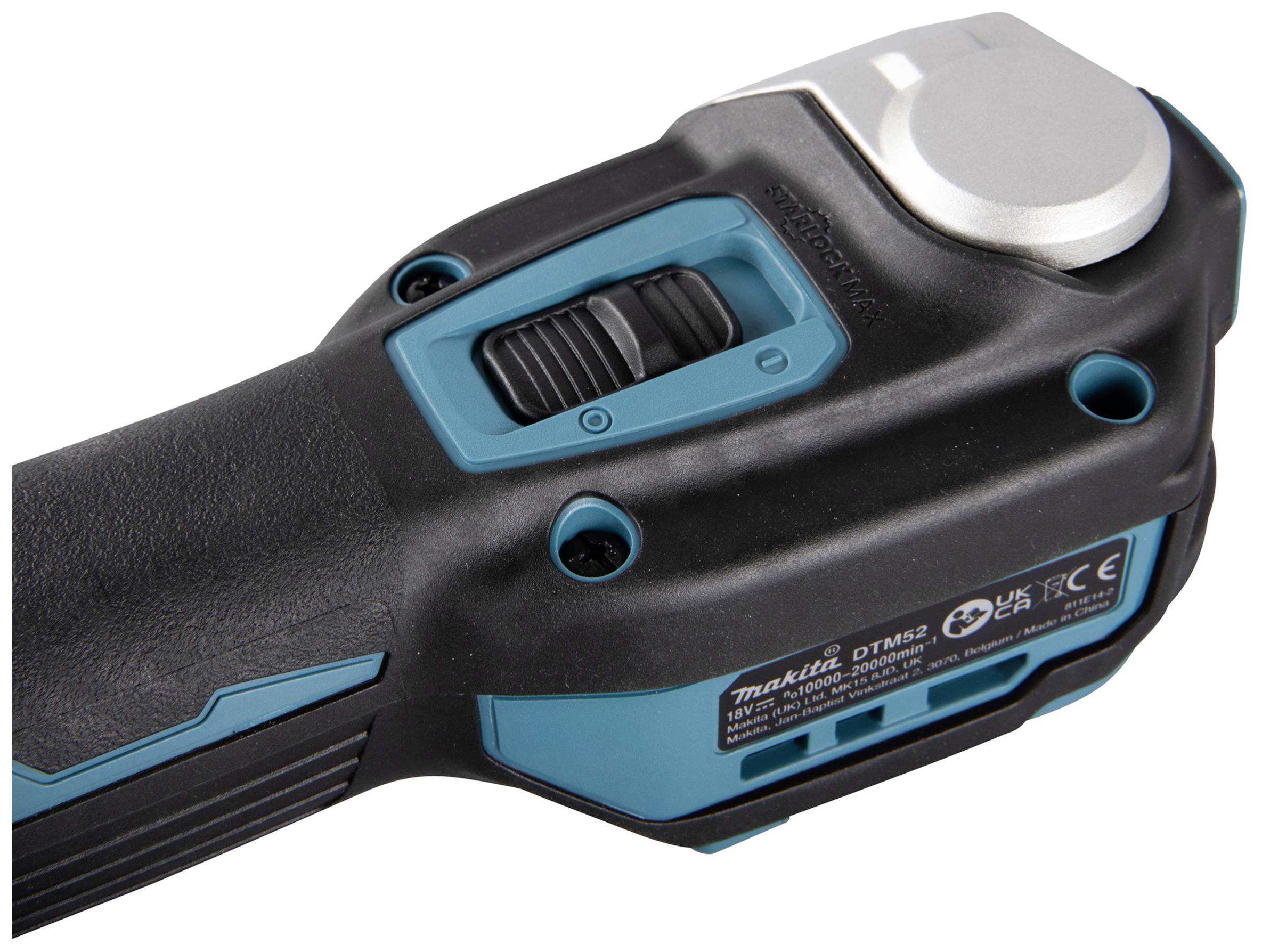 Close-up of a cordless power tool with a blue and black casing and a speed control switch.