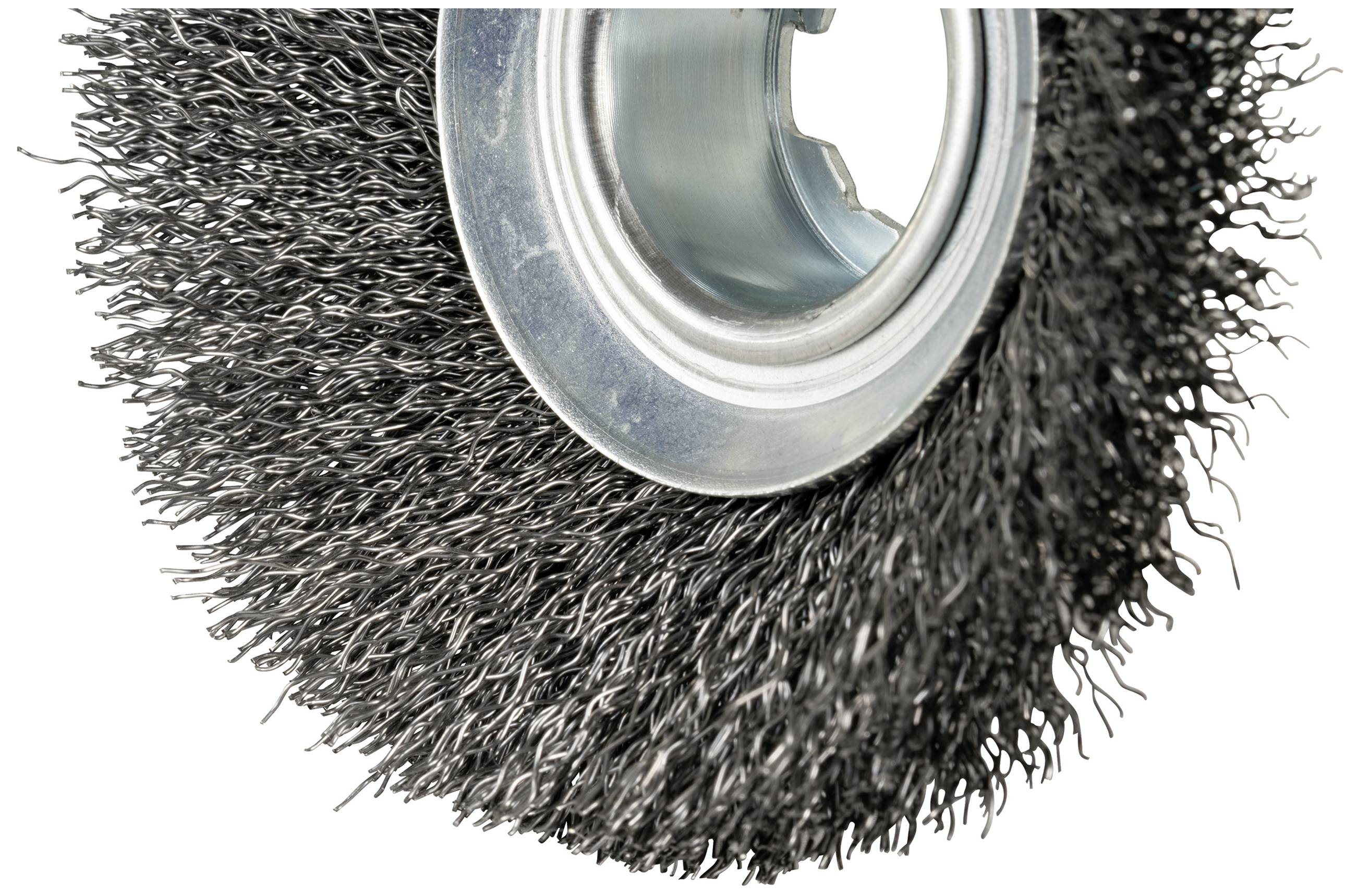 A circular metal brush with dense bristles, used for grinding or cleaning purposes.